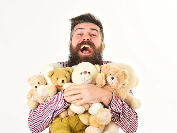 Sharing and generosity concept. Generous man prepared many teddy bears — Stock Photo, Image