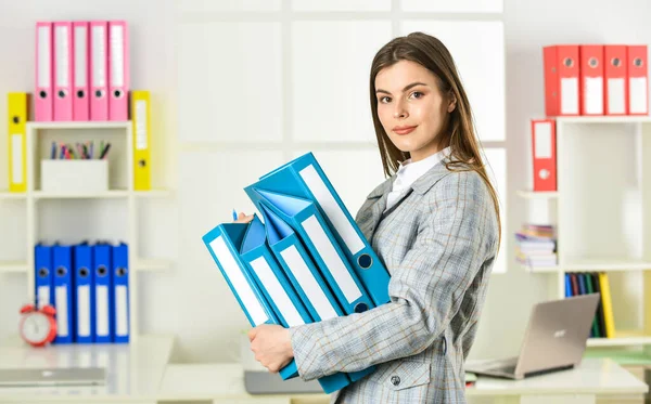 Girl businesswoman with documents. Administrator secretary. Office worker. Formal fashion. Woman hold office folder. College university student. Responsible trainee. Cute shy woman in jacket