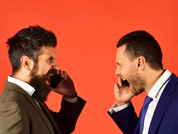 Business talk and rivalry concept. Men with beards