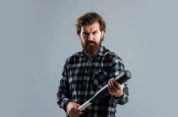 sport equipment shop. man with baseball bat. i am a criminal. aggression and anger. brutal male hipster ready to fight. mature man in checkered shirt. success at any cost. outdoor sport activity