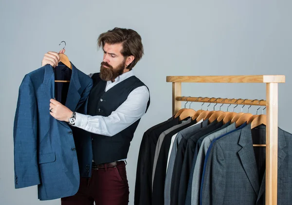 Fashion designer at work. confident tailor designing male jacket. handsome sartor with tape measure. male beauty and fashion. bearded man tailoring clothes. formal and office wardrobe. businessman — Stock Photo, Image