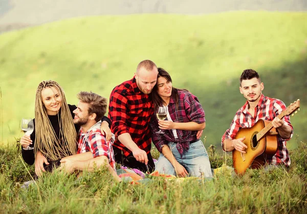 Spending summer day. group of people spend free time together. family camping. hiking adventure. happy men and girls friends with guitar. friendship. romantic picnic in tourism camp. campfire songs — Stock Photo, Image