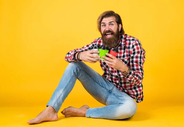 He likes all. man drink hot tea from paper cup. good morning. energetic warm take away beverage. need some coffee to go for inspiration. happy bearded man drinking morning coffee — Stock Photo, Image