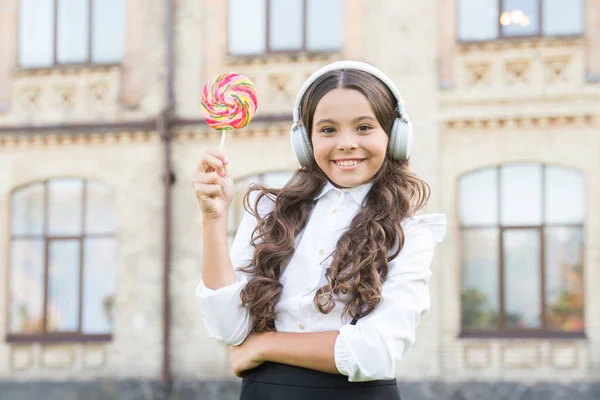 Happiness concept. Happy kid outdoors. Cheerful schoolgirl. Schoolgirl listening music. Happy childhood concept. International childrens day. Smiling pupil. Real success. Happy song. Leisure and rest — Stock Photo, Image
