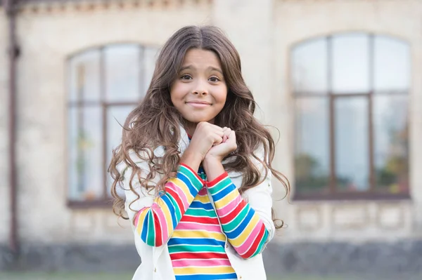 Small girl gorgeous hairstyle adorable smile urban background, so cute concept — Stock Photo, Image