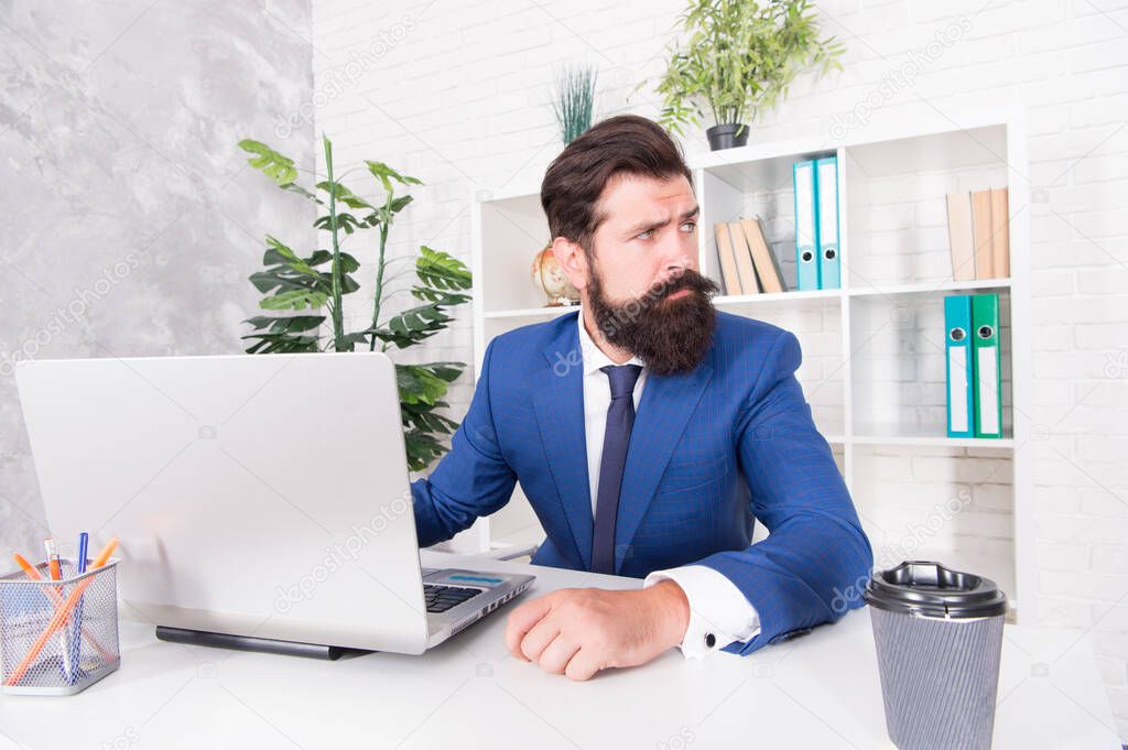 Man inspired manager work online laptop, dreaming big concept