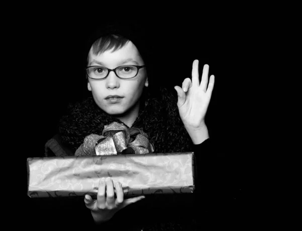 Boy nerd with present box — Stock Photo, Image