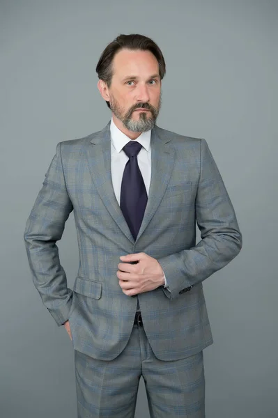 Giving man confidence. Bearded man grey background. Mature man in formal style. Fashion look of business man. Office style. Business attire. Fashion wardrobe. Menswear store. Get exclusive formalwear