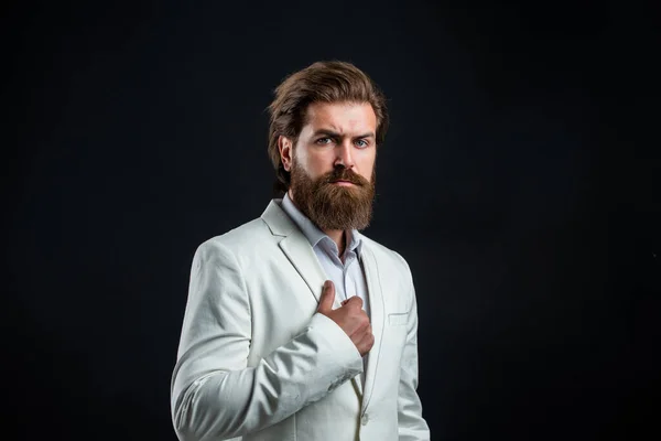 Well groomed hipster public figure man white suit, jet set concept