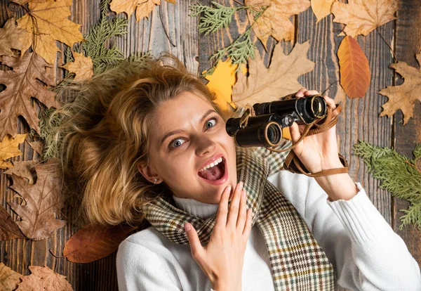Totally happy. looking for autumn shopping sales. discover fall season. Woman Looking Through Binoculars. Travel Holidays Journey Concept. in autumn forest. Bird watching tours. cold season concept — Stock Photo, Image