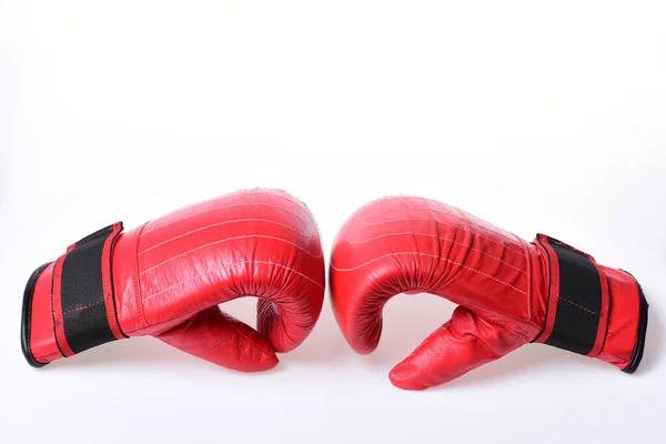 Sports and martial arts concept. Boxing gloves in red color
