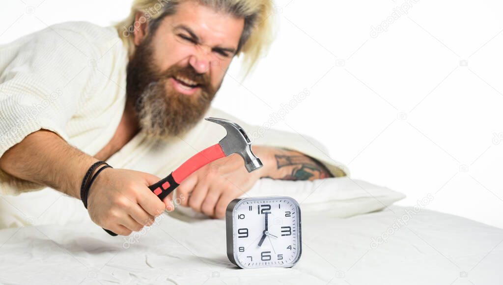 Need relax. Bearded man hipster want sleep. Stages of sleep. Man awake unhappy with alarm clock ring. Sleep longer. Sleep paralysis can also occur when you are in process of waking up. Anger concept