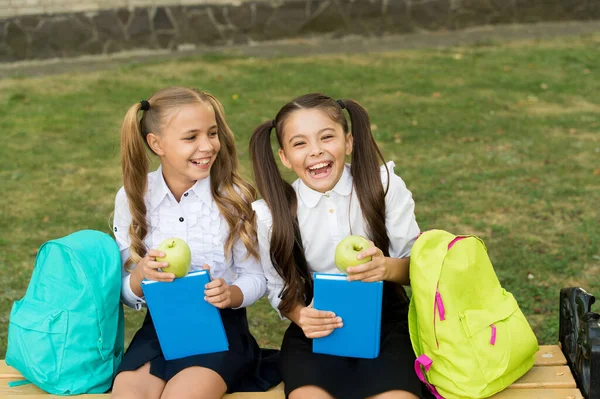 Happy school friends little girls having fun, emotional development concept