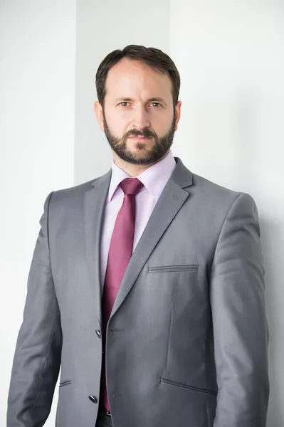 Man with beard in blue jacket, shirt and tie — Stock Photo, Image