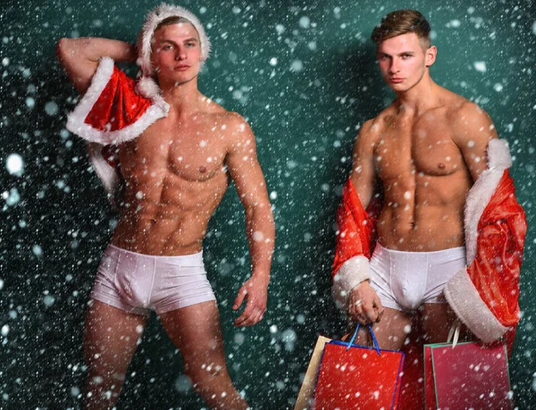 Yakışıklı maço Noel Baba ikizleri — Stok fotoğraf