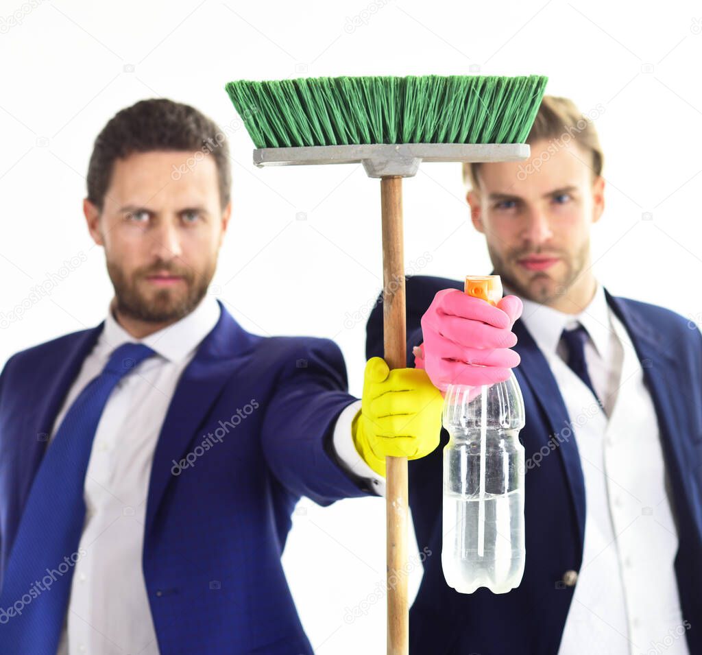 Bearded guys in formal suits with smiling faces and sweep.