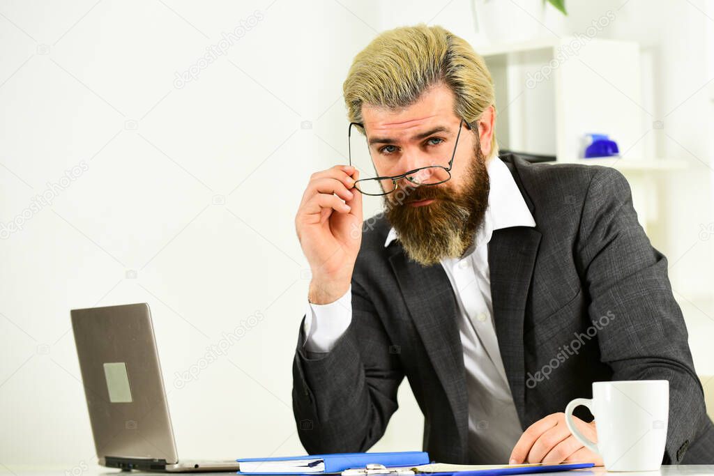 Work hard play hard. modern office life. distant work while coronavirus quarantine. mature school teacher. Business-minded businessman. bearded man in jacket with laptop. boss in workplace