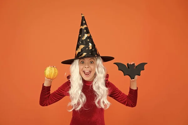 Halloween party. Small girl in black witch hat. Autumn holiday. Join celebration. Halloween attributes. Little child in witch costume. Magical spell. Small witch with white hair. Wizard or magician — Stock Photo, Image