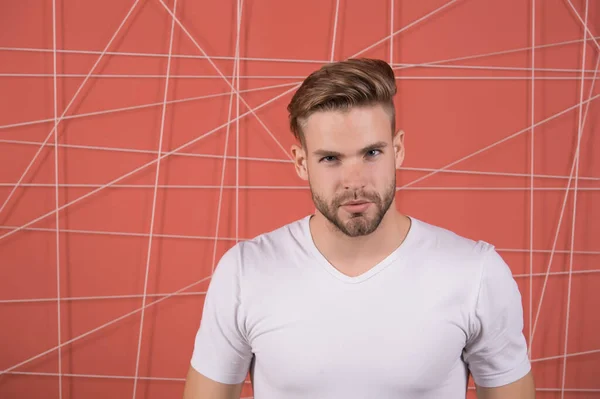 Simple hacks to make hairstyle better. Use right product styling hair. Confident with tidy hairstyle. Barber hairstyle tips. Man bearded guy modern hairstyle in pensive mood pink background