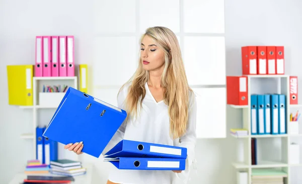 Female business. Business woman work in office with documents. Female career. Organized office work. Accounting paper documents files. Routine paperwork. Manager or coordinator. Female leadership