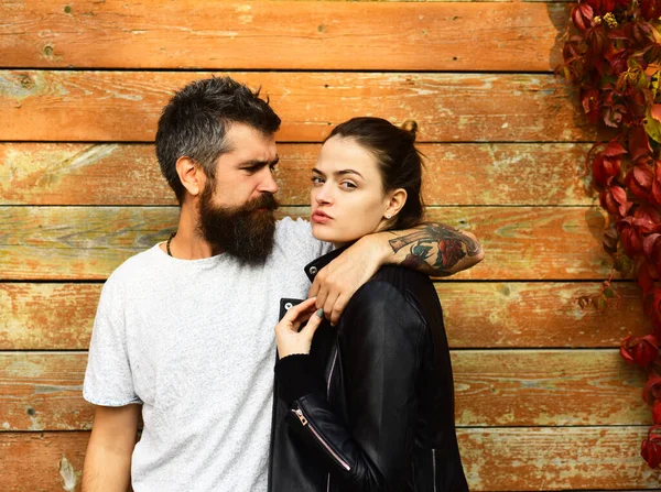 Couple in love cuddles. Girl and bearded guy or lovers — Stock Photo, Image