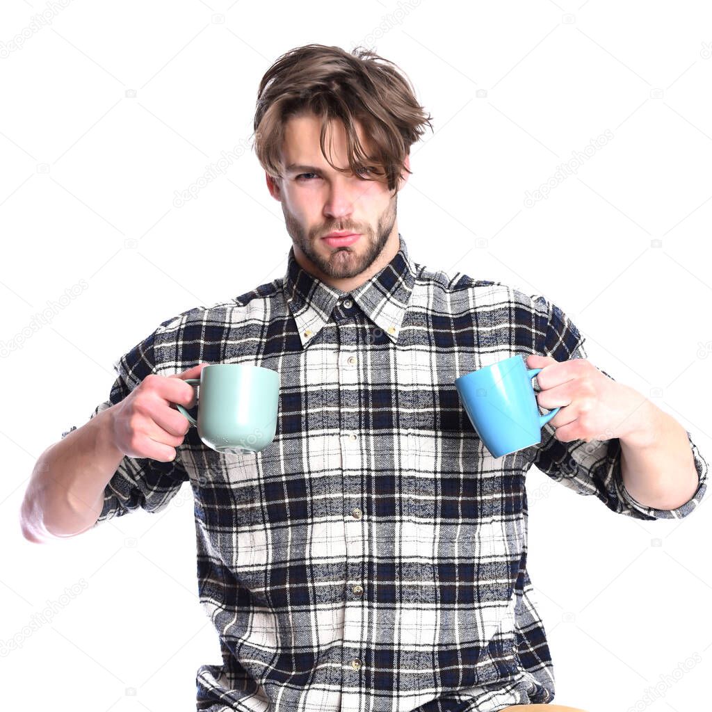 handsome guy holding cups isolated on white background