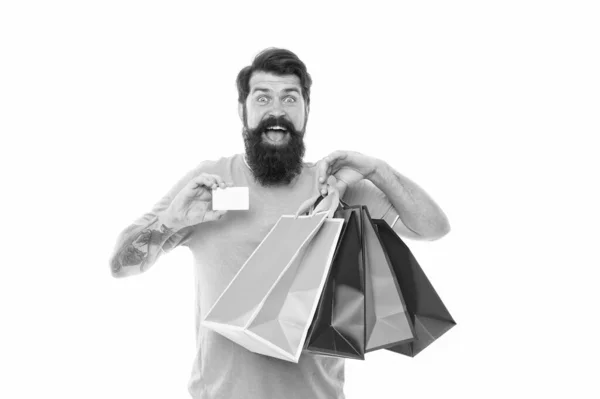 Payment method. day of sell out. man showing credit card. Very good offer. nice purchase. Big Sale online in our shop. ready to pay online. successful shopping. bearded man carry heavy shopping bags — Stock Photo, Image