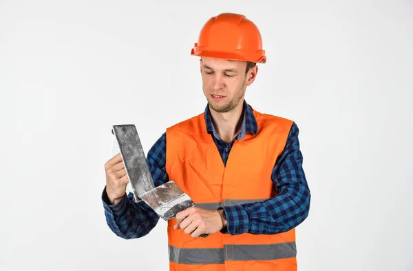 Man plasterer with tools wear protective hard hat, illegal worker abroad concept — Stock Photo, Image