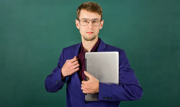 New technology. back to school. male with computer. knowledge ay concept. man looking smart in glasses. office clothes and fashion concept. ready for learning. successful businessman in jacket — Stock Photo, Image