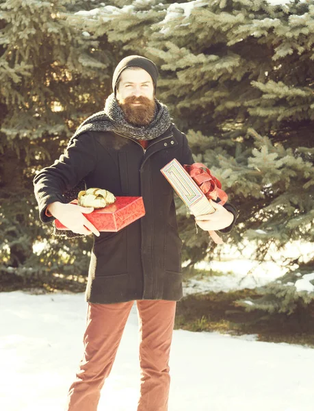 Happy man with gift boxes — Stock Photo, Image