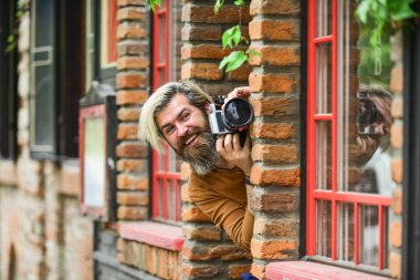 Yaratıcı kariyer. Fotoğraf çekimi. Retro kameralı zalim adam. Profesyonel fotoğrafçı klasik kamera kullanır. Fotoğrafçılık işi. Casus paparazzi işgali. Yaratıcı fotoğrafçı şehir geçmişi
