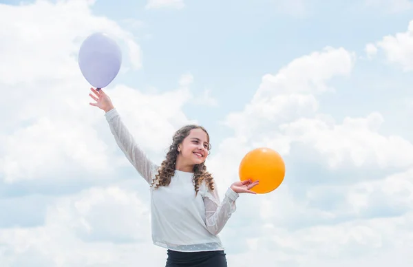 Higher and higher everyday. Cheerful girl have fun. Freedom concept. Happiness is air balloons. Summer holidays and vacation. Childhood happiness. Happiness concept. Fly with helium balloons — Stock Photo, Image