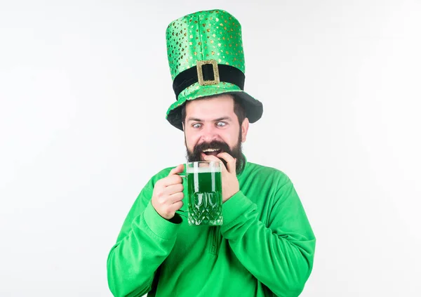 Drinking beer part of celebration. Irish pub. Alcohol consumption integral part saint patricks day. Discover culture. Irish tradition. Man brutal bearded hipster drink pint beer. Green beer mug — Stock Photo, Image