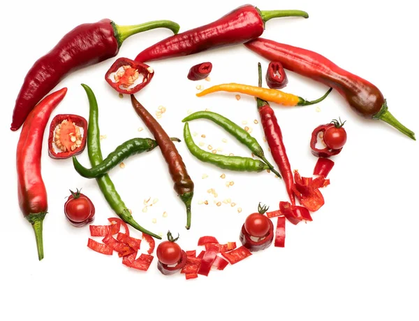 Chopped chili peppers in red color around sign. — Stock Photo, Image