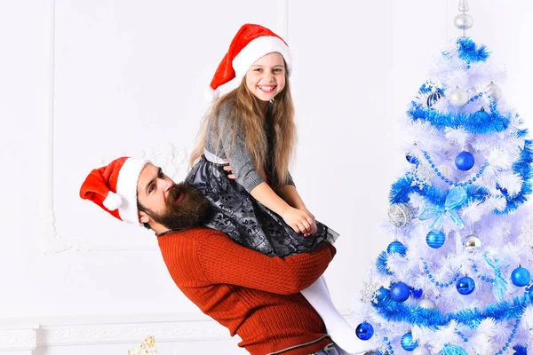 Christmas eve and New Year concept. Girl and bearded man