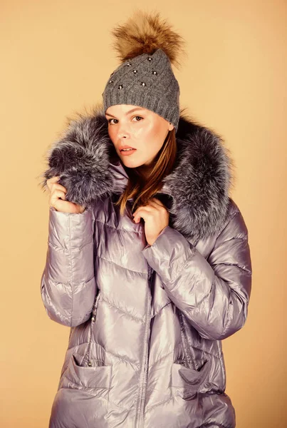 Faux fur. Casual winter jacket slightly more stylish and have more comfort features such as larger hood fur trim on hood. Fashion girl winter clothes. Fashion coat and hat. Fashion trend. Warming up — Stock Photo, Image