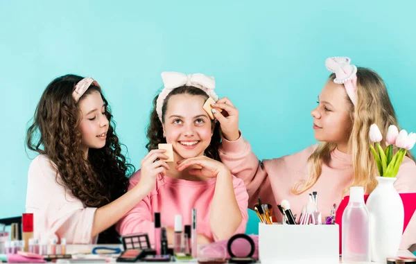 childhood happiness. retro kids put on makeup. skin care cosmetics for children. Following personal style. three happy girls at hairdresser. friendship and sisterhood. family bonding time