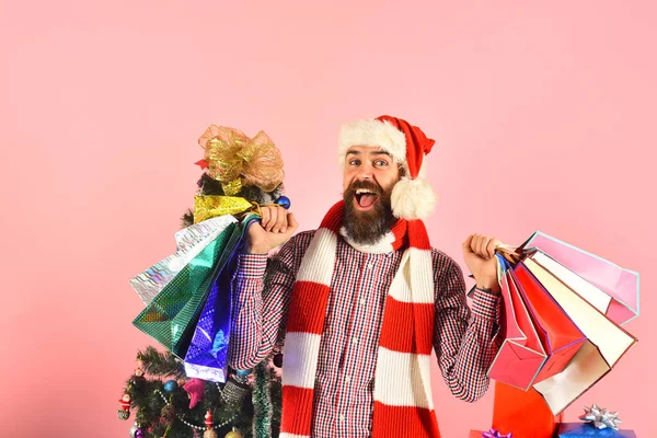 Man with beard and cheerful face on pink background.