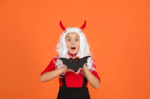 Halloween child in imp hors with bat party accessory express feeling of surprise, halloween fear — Stock Photo, Image