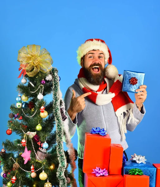 Man with beard and cheerful face on blue background