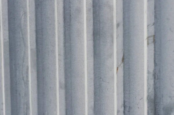 Abstraktní šedá betonová stěna architektonická struktura s texturovaným povrchem, zázemí — Stock fotografie
