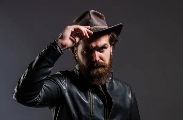 Brutal man cowboy hat leather jacket, western style concept