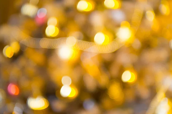 Defocus Christmas lights niewyraźne musujące plamy bokeh efekt abstrakcyjne tło, Boże Narodzenie — Zdjęcie stockowe