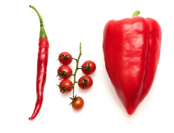Tomato branch with hot pepper. Cherry tomatoes with bell pepper — Stock Photo, Image