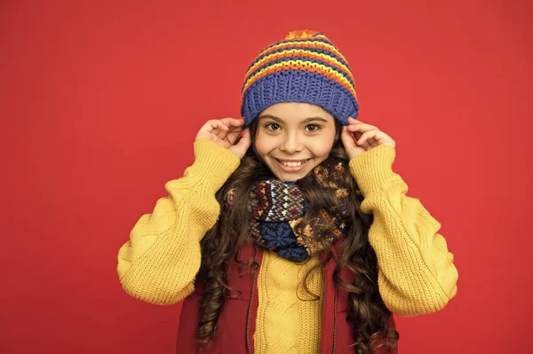 Fashion shop. Happy childhood. Winter fashion for kids. Happy winter holidays activity. Feeling warm and happy. Cheerful smiling hipster child long hair in stylish outfit. Winter ideas for fun