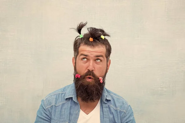 Masculine enough. Having fun party. Man adult bearded handsome hipster childish hairstyle colorful ponytails. Hair accessory. Made for fun. Funny style. Crazy guy. Fun with hair. Hairdresser salon — Stock Photo, Image