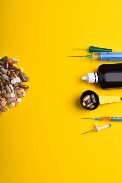 Pills and capsules put in half circle. Set of tablets