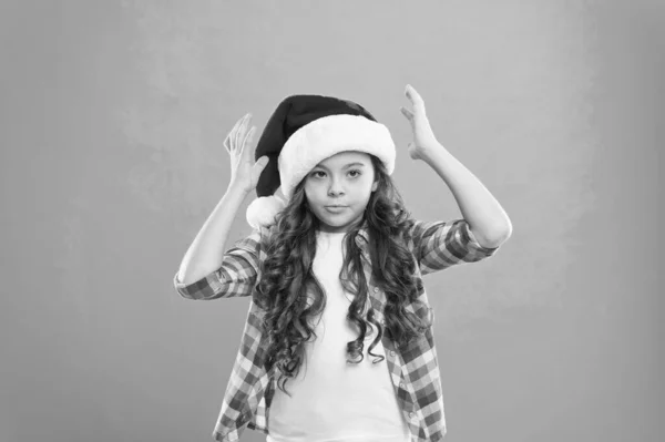 How do i look. Winter spirit. New year party. Santa claus fancy kid. Little girl child in santa hat. Happy winter holidays. Small girl. Adorable smiling baby waiting for Santa. Greetings concept — Stock Photo, Image