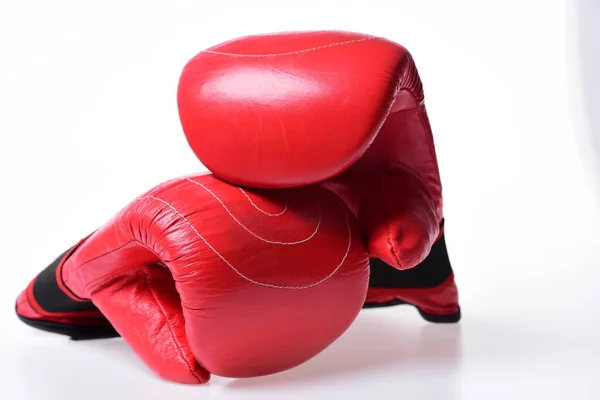 Boxing gloves in red color isolated on white background