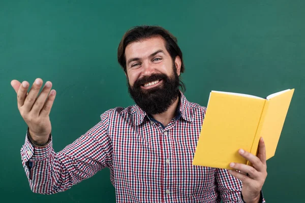 happy mature college guy holding book, happiness